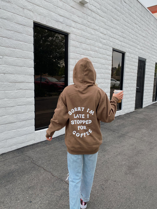 brown "SORRY I'M LATE I STOPPED FOR COFFEE" hoodie