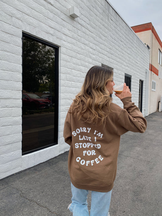 brown "SORRY I'M LATE I STOPPED FOR COFFEE" hoodie