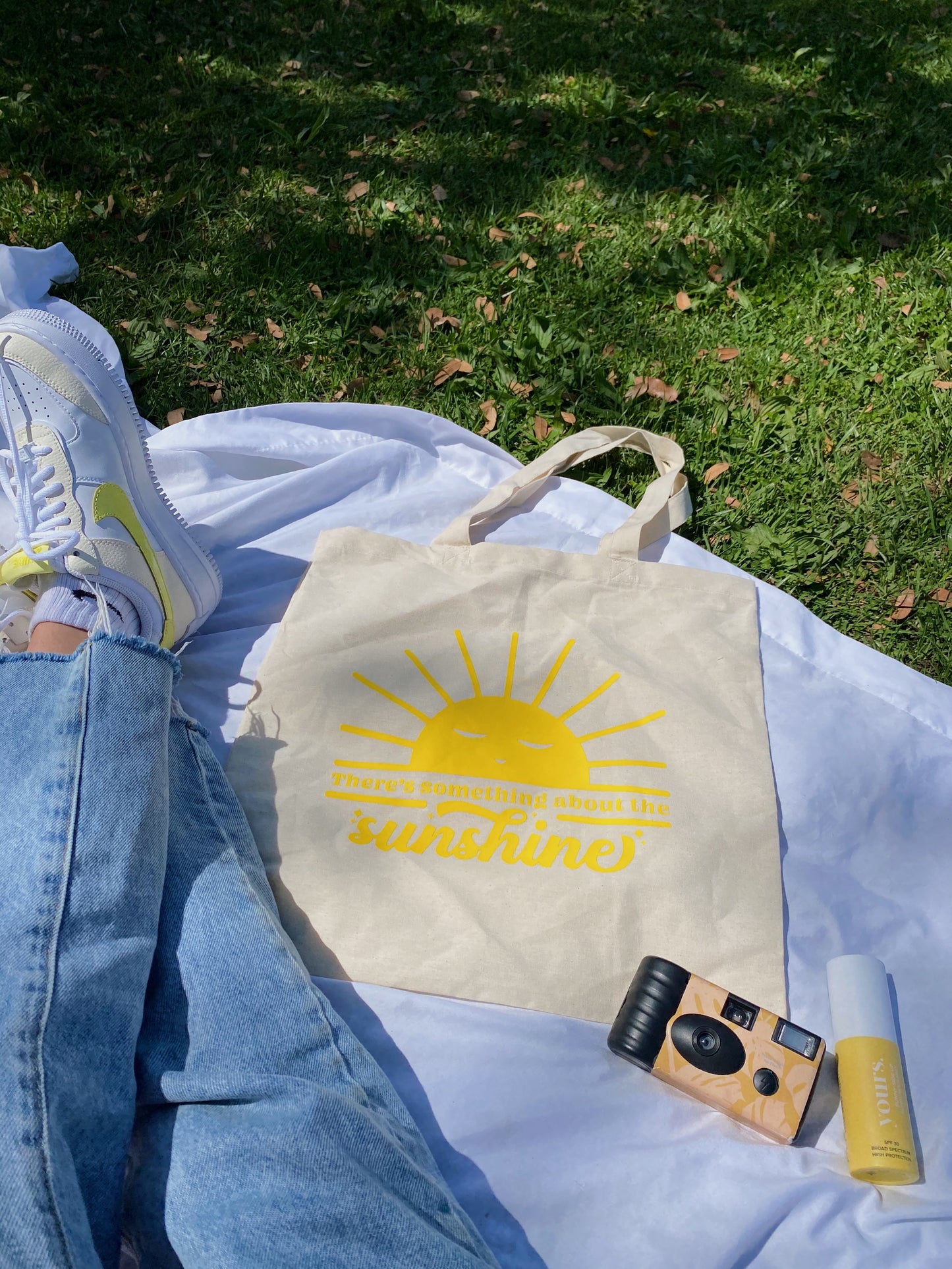 yellow "there's something about the sunshine" tote bag